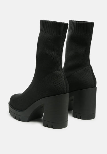 zinnia knitted block heeled boots#color_black